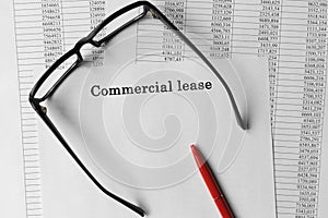 Commercial leasing paper on the table