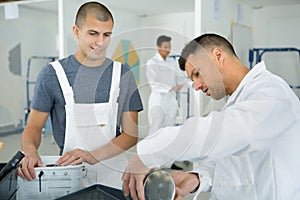 commercial painting apprentice and teacher