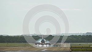 Commercial plane landing at the airport with strong crosswind