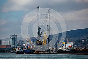 Commercial port terminal with cargo cranes in Novorossiysk