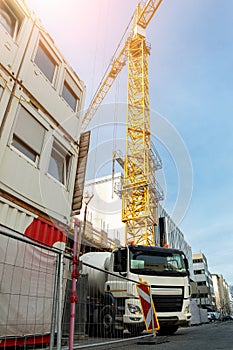 Commercial or residential corporate hightower building construction site with different heavy machinery. Concrete cement
