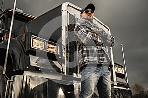 Commercial Truck Driver in Front of His Semi Tractor