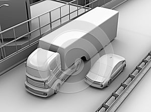 Commercial truck trying change lane and a sedan car on truck`s blind spot position