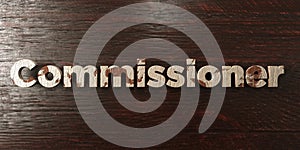 Commissioner - grungy wooden headline on Maple - 3D rendered royalty free stock image photo