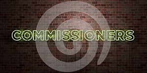 COMMISSIONERS - fluorescent Neon tube Sign on brickwork - Front view - 3D rendered royalty free stock picture