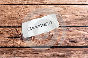 Commitment text on torn paper