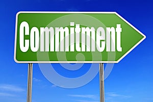 Commitment word with green road sign