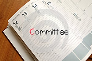 Committee text concept on notebook