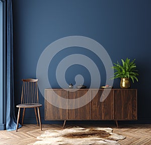 Commode with chair and decor in living room interior, dark blue wall mock up background photo