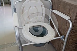 Commode chair or mobile toilet can moving in bedroom or everywhere for elderly old disabled people or patient in hospital, healthy