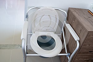 Commode chair or mobile toilet can moving in bedroom or everywhere for elderly old disabled people or patient in hospital, healthy