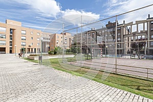 Common areas with a seven-a-side soccer field, gardens and children\'s play areas in a residential housing development photo