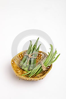 Common bean or dolichos bean pods and okra, farm fresh concept