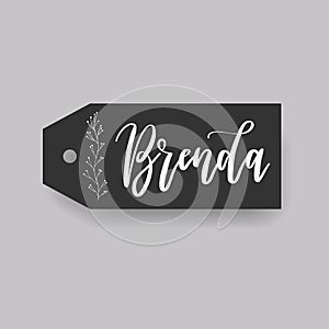Common female first name on a tag. Hand drawn photo