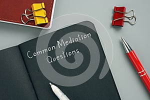 Common Mediation Questions phrase on the piece of paper