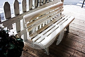 Common plastic public bench in the street for passersby