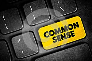 Common Sense - practical judgment concerning everyday matters, text button on keyboard, concept background