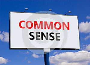 Common sense symbol. Concept words Common sense on beautiful big white billboard. Beautiful blue sky cloud background. Business,
