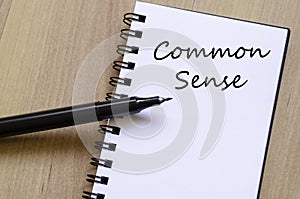 Common sense write on notebook