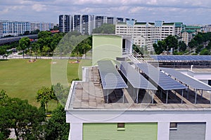 Common to see solar panels installed on roof tops of HDB blocks in Singapore to harness green energy the aim to being carbon-