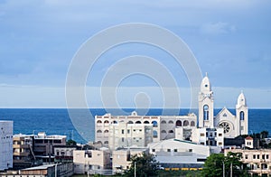 Commonwealth of Puerto Rico-White church, blue sky, blue ocean