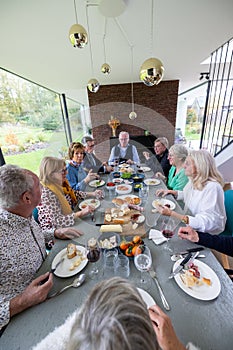 Communal Dining: Seniors Enjoying a Meal Together