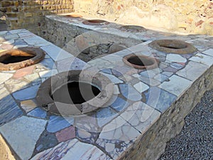 Communal latrine at Roman historical site photo