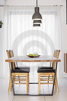 Communal table with chairs