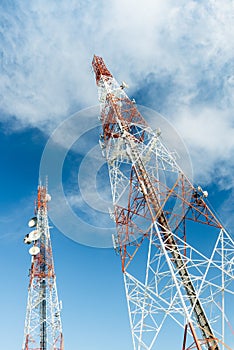 Communication antenna tower with blue sky