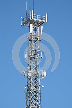 Communication antenna tower and repeater equipment photo