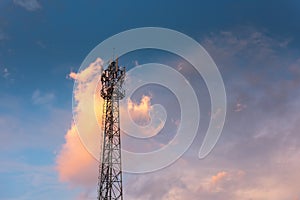 Communication Antenna Tower for Telecommunication Network Against Blue Sky Background on Sunrise. Technology Cellular and