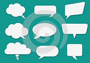 Communication bubbles in paper style on the green background. Speech bubbles