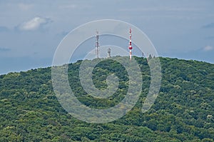 Communication and lookout towers on top of a hill near PEcs