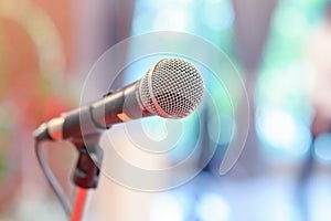 Communication microphone on stage against a background of auditorium Concert stage