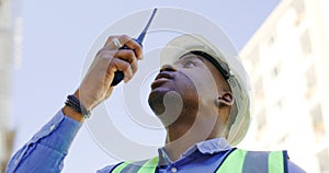 Communication, radio and construction worker, man or manager for project management in urban city. African builder in