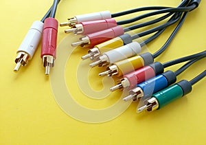 Communication rca audio video cable on a yellow background