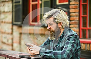 Communication. Send email. Responding message. Urban wifi. Smartphone settings. Application concept. Bearded hipster man