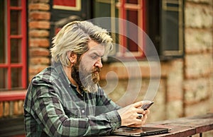 Communication. Send email. Responding message. Urban wifi. Smartphone settings. Application concept. Bearded hipster man