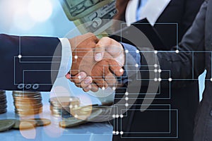 Communication technology for business, global networks and telecommunications,business handshake with stack of coins