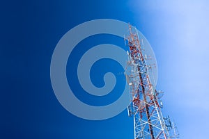 Communication tower against blue sky