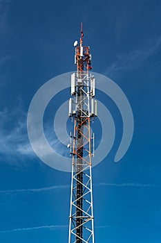 Communication Tower With Antennae And Satellite Dishes