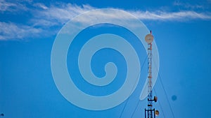 Communication tower on blue sky