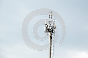 Communication tower design or Construction of communication mast on cloudy sky. Wi-Fi wireless network, mobile communication,