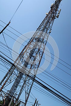 communication tower, electrical tower, power grip, telecommunication tower, mobile phone relay tower, with cables and other