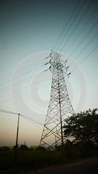 communication tower, electrical tower, power grip, telecommunication tower, mobile phone relay tower, with cables and other