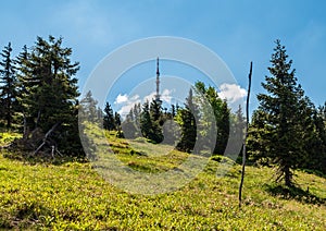 Communication tower on Praded hill from hiking trail near Svycarna hut in Jeseniky mountains