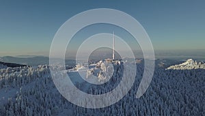 Communication Tower and Ski Tracks in Uludag, Turkey. Aerial View of Snowy Peaks