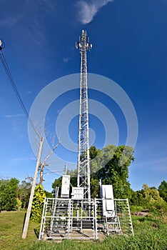 Communication towers on blue sky