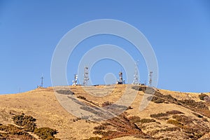 Communication towers on a mountain top day light