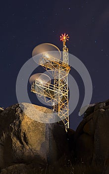 Communications antenna at night